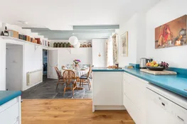Looking from the kitchen to the dining area