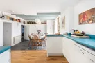 Looking from the kitchen to the dining area