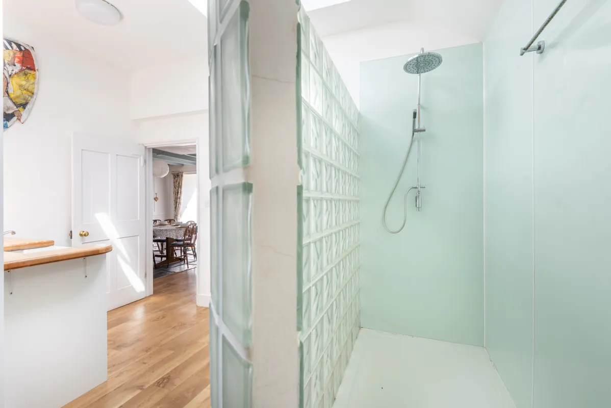 The ground floor shower in the utility room