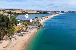 The White House, perched on the clifftops of Torcross, overlooking Start Bay and Slapton Ley, a 4 bedroom, pet friendly holiday home in South Devon.