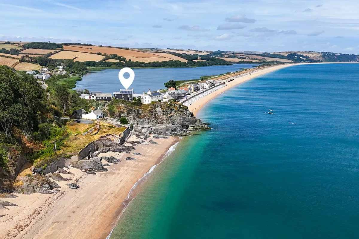 The White House, perched on the clifftops of Torcross, overlooking Start Bay and Slapton Ley, a 4 bedroom, pet friendly holiday home in South Devon.