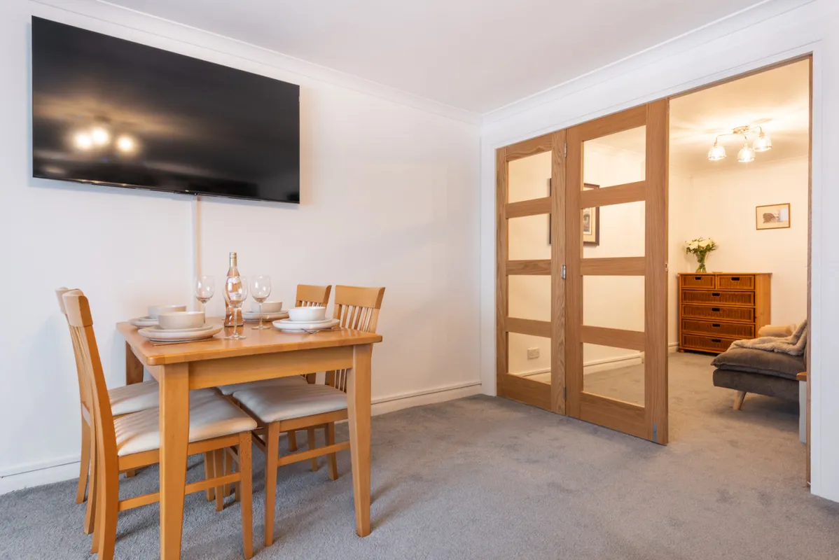 Dining area with table and chairs 4