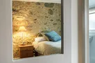 Meads Cottage, Charmouth: Such beautiful exposed stone in bedroom two