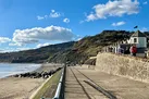Take a stroll at Charmouth Beach and admire the unique geology of the Jurassic Coast