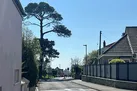 The beach sits at the bottom of the road just a minute away