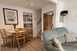 Meads Cottage, Charmouth: Stairs lead up to the first floor from the dining area