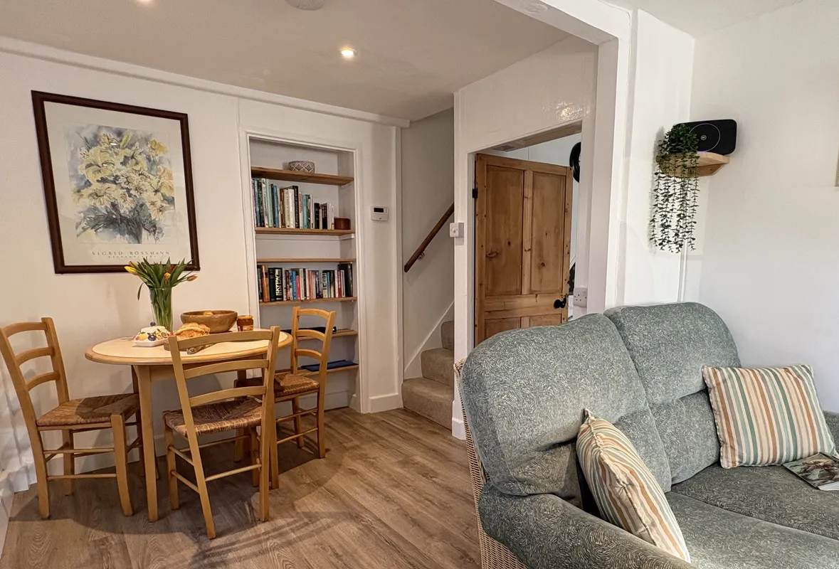 Meads Cottage, Charmouth: Stairs lead up to the first floor from the dining area