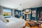 The master bedroom with 7 ft emperor bed.