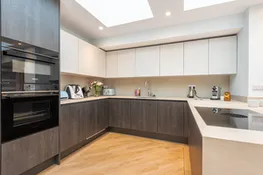 Another view of the stylish well equipped kitchen.