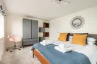 Bedroom 1, with 5' king size bed, en suite shower and sea views!