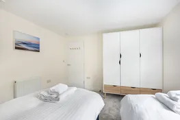 Bedroom 2 with twin 3 ft beds that can be accommodated as a super king.