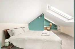 The second floor bedroom with velux windows and sea views.