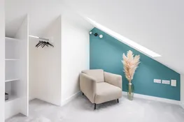 Space to relax in the second floor bedroom.