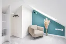 Space to relax in the second floor bedroom.