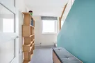 The first floor hall with steps to the second floor.