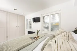 Built in wardrobe in bedroom two - Happy Days Cottage