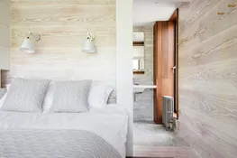 The master bedroom looking through to the en suite shower room