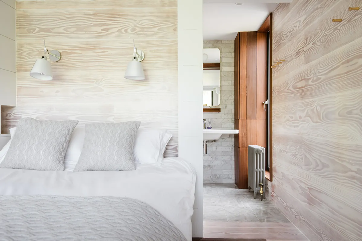 The master bedroom looking through to the en suite shower room