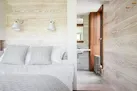 The master bedroom looking through to the en suite shower room