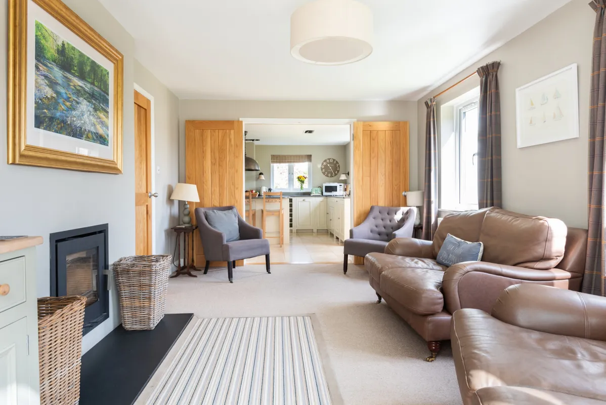 Comfortable, spacious living room with log burner for superb winter breaks
