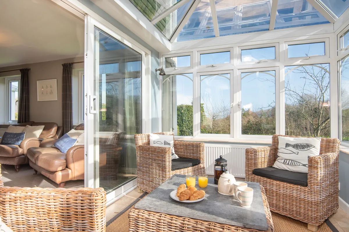 The conservatory gives another space to relax.