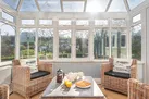 When the sun is hiding, get a feel of al fresco in the conservatory.