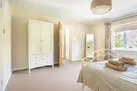 Bedroom 2, with views to the front of the property and a 5' kingsize bed