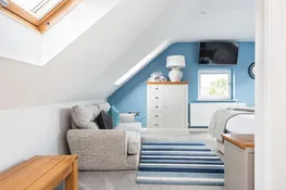 The master bedroom is large enough to use as a relaxing escape when you need time alone.