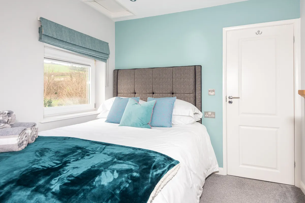 The tranquil double bedroom.