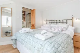 The master bedroom with en suite in Upper Reeds.