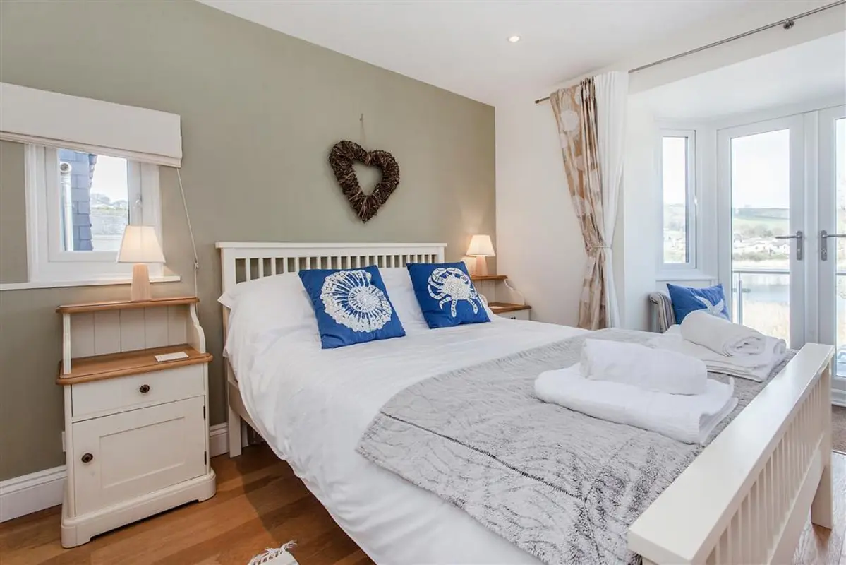 The first floor rear double bedroom with views over the Ley.