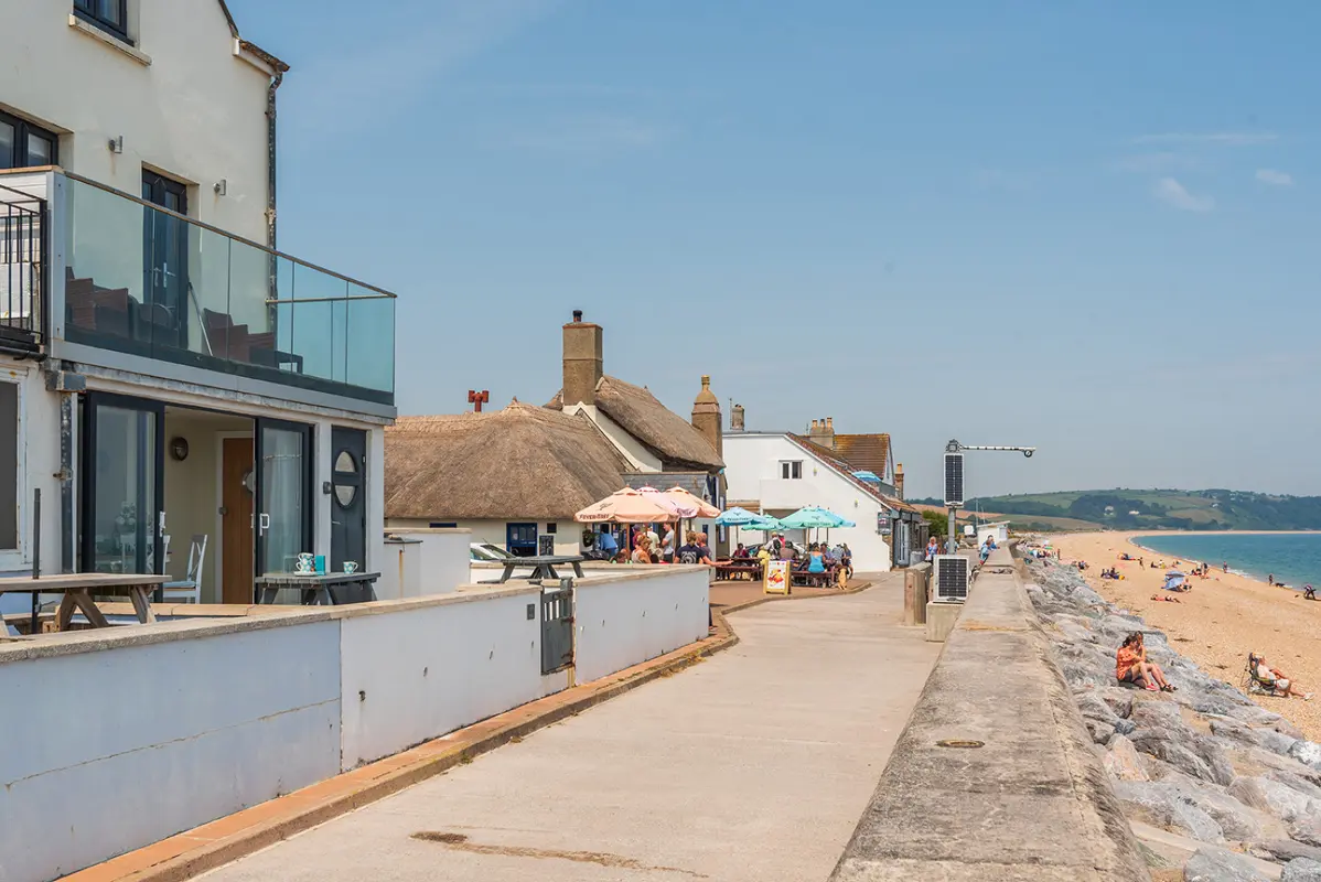 Another view of the terrace with the Start Bay Inn in shot