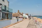 Another view of the terrace with the Start Bay Inn in shot